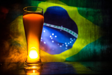 Soccer 2018. Creative concept. Single beer glass with beer on table ready to drink. Support your country with beer concept.
