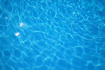 beautiful blue pool in sunny summer weather