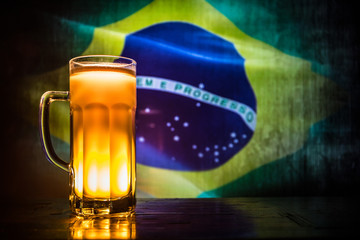 Soccer 2018. Creative concept. Single beer glass with beer on table ready to drink. Support your country with beer concept.