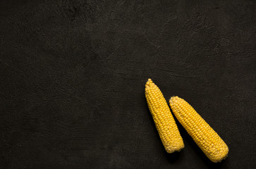 corn black stone background healthy vegetarian food © natalysavina