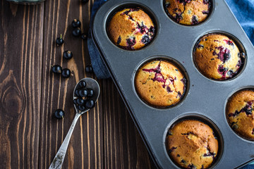 Homemade delicious muffins with fresh berries 