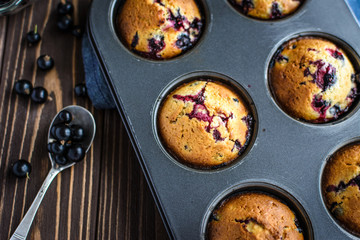 Homemade delicious muffins with fresh berries 