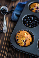 Homemade delicious muffins with fresh berries 