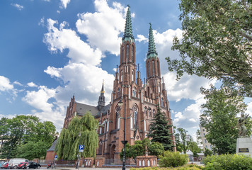 Facade of Cathedral of St. Michael the Archangel and St. Florian the Martyr in Warsaw, Poland - obrazy, fototapety, plakaty