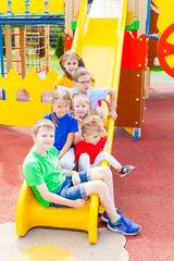 Fototapeta na wymiar Happy kids playing at the playground.