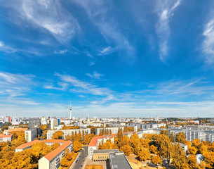 Eastern Berlin from above: houses, television tower on Alexanderplatz and city skyline in Autumn - obrazy, fototapety, plakaty