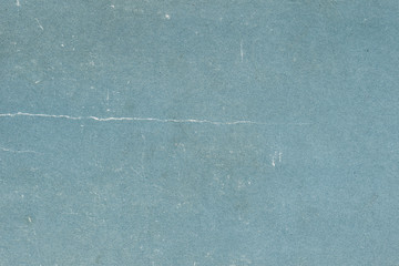 Txture of blue aged paper sheet, dirt stains, spots, wrinkle, grunge vintage background