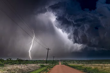 Fotobehang Lightning storm over field in Roswell New Mexico © cherylvb