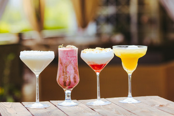 cocktails in the background of the restaurant.