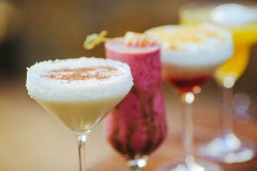 cocktails in the background of the restaurant.