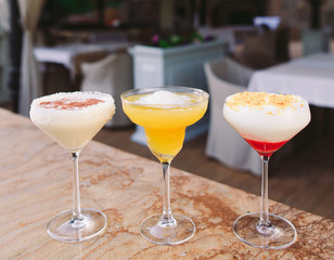 cocktails in the background of the restaurant.