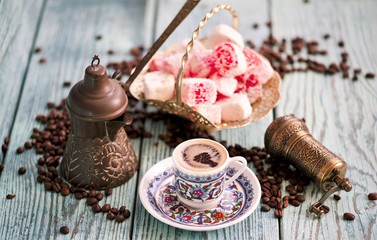 Fototapeta na wymiar Cup of coffee with turkish delight