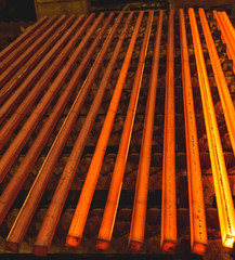 Hot square steel bloom on the roll-table