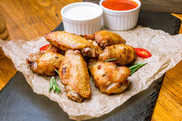 Chicken wings with blue cheese sauce