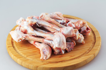  raw chicken bones on white background