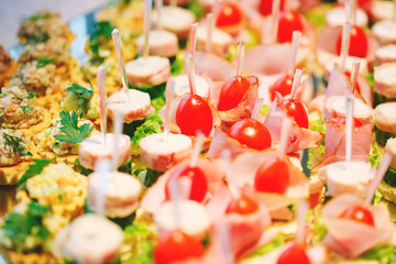 Assortment of canapes. Banquet service.