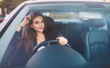 Fototapeta na wymiar Woman in car