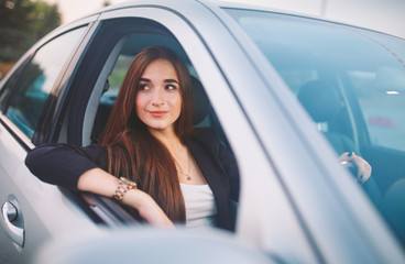 Fototapeta na wymiar Woman in car