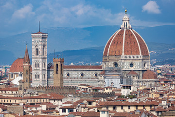 Fototapeta na wymiar Florence seen from afar with cathedral towering over city
