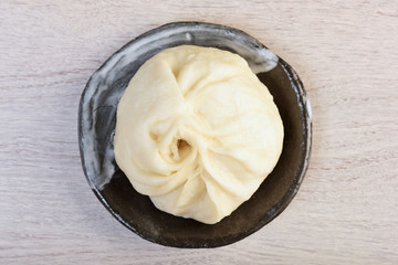 Steamed stuffed buns on a plate        