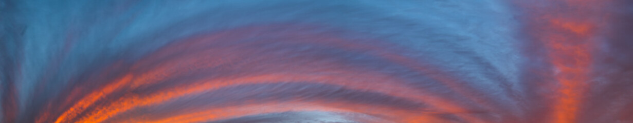 The clouds above the sky creating an amazing view of lines and formations with different lights and colors