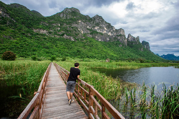 The wooden bridge overlooking the scenery at Sam Roi Yod National Park. It is beautiful and surrounded by nature in Prachuap Khiri Khan, Thailand.