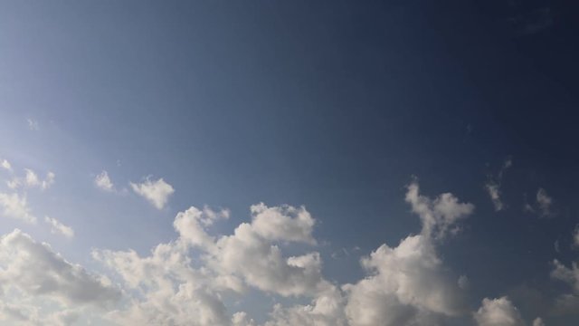 The movement of clouds over the sky in the time-lapse