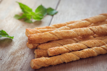 Bread sticks on old wooden table