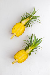 Pineapple on white wall background.