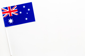 Australian flag concept. Small flag on white background top view copy space
