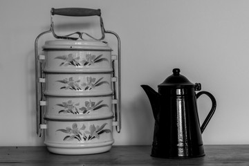 Old Kettle and Tiffin food transport device black and white
