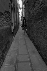 young mother and little daughter posing in  venice