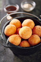 Cheese Balls in Metal Bowler on Dark Background