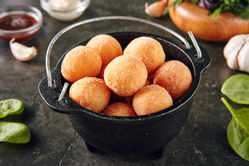 Cheese Balls or Chicken Croquettes on Rustic Backdrop