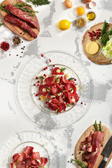 Pieces of stroganina on plate