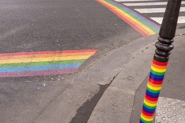 Gay pride flag crosswalks in Paris gay village (Le Marais)