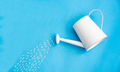 White watering canopy on colorful floor - Environmental concept © photobyphotoboy