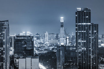 night urban cityscape on blue filter