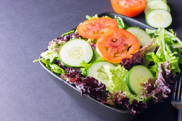 Garden salad with fresh tomatoes and cucumbers