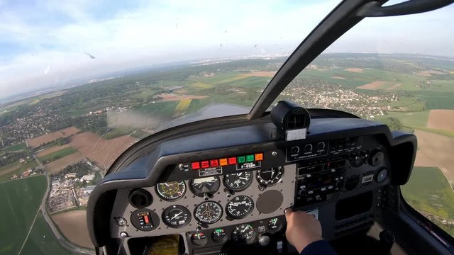 Pilot and cockpit view from single engine propeller aircraft around Chavenay, France