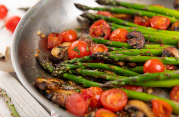 Asparagus Cooked with Cherry Tomatoes and Mushrooms