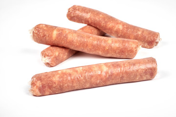 Raw meat sausages isolated on white background