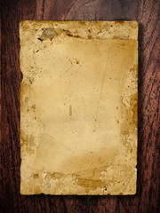 old paper on wooden board