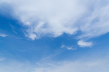 Naklejka na ściany i meble Blue sky and clouds background.