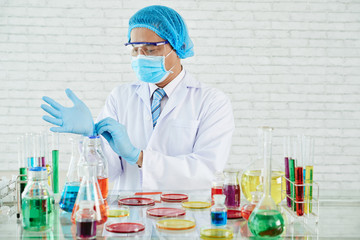 Scientists experimenring in laboratory