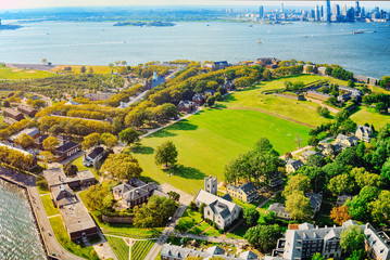 Governors Island National Monument near New York and Manhattan from a bird's eye view. - obrazy, fototapety, plakaty