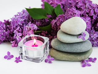 spa products and lilac flowers