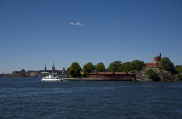 Obraz premium Castle and landmarks at Stockholm waterfront a summer day 