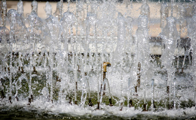     Water splashes in the fountain shot close-up 