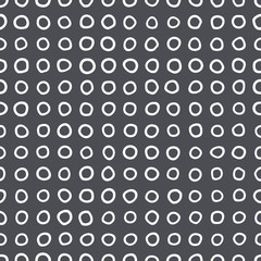 Seamless pattern of rings of irregular shape.